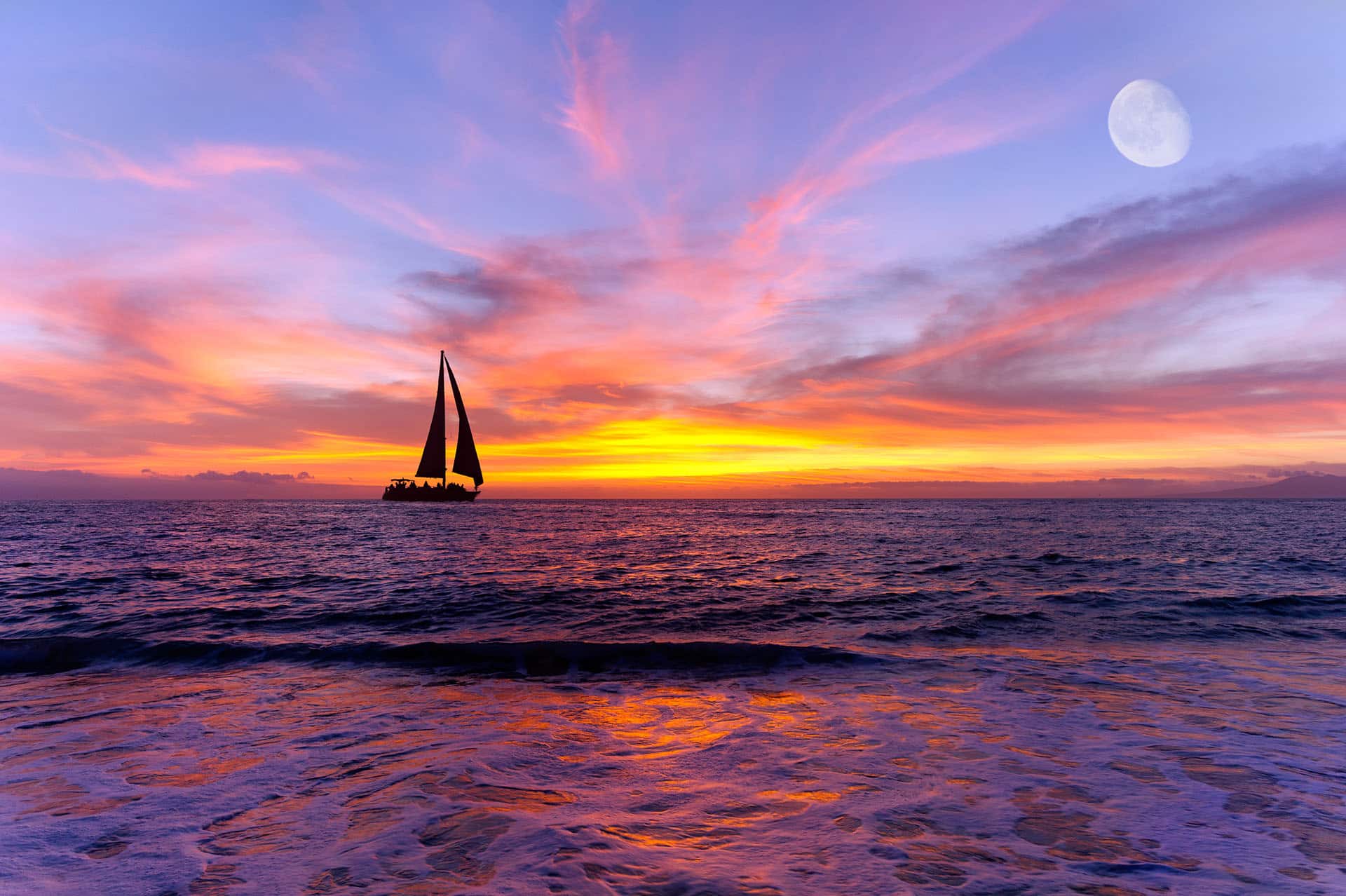 Sailboat at sunset.